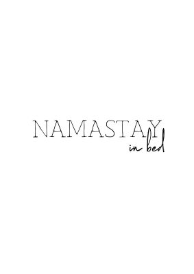 An unframed print of namastay in bed funny slogans in typography in white and black accent colour