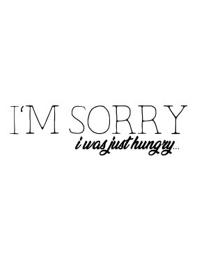 An unframed print of sorry i was hungry funny slogans in typography in white and black accent colour