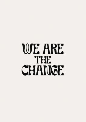 An unframed print of we are the change quote in typography in white and black accent colour