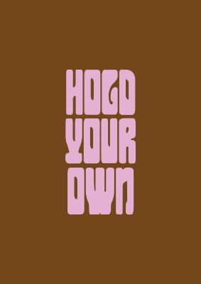 An unframed print of hold your own quote in typography in brown and pink accent colour