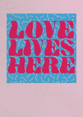 An unframed print of love lives here textured quote in typography in blue and pink accent colour